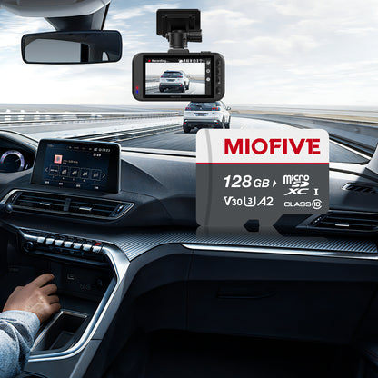 Miofive 128GB V30 A2 microSDXC card shown inside a car interior with a front windshield dash cam recording the road.