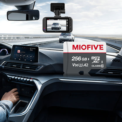 Miofive 256GB V30 A2 microSDXC card shown inside a car interior with a front windshield dash cam recording the road.